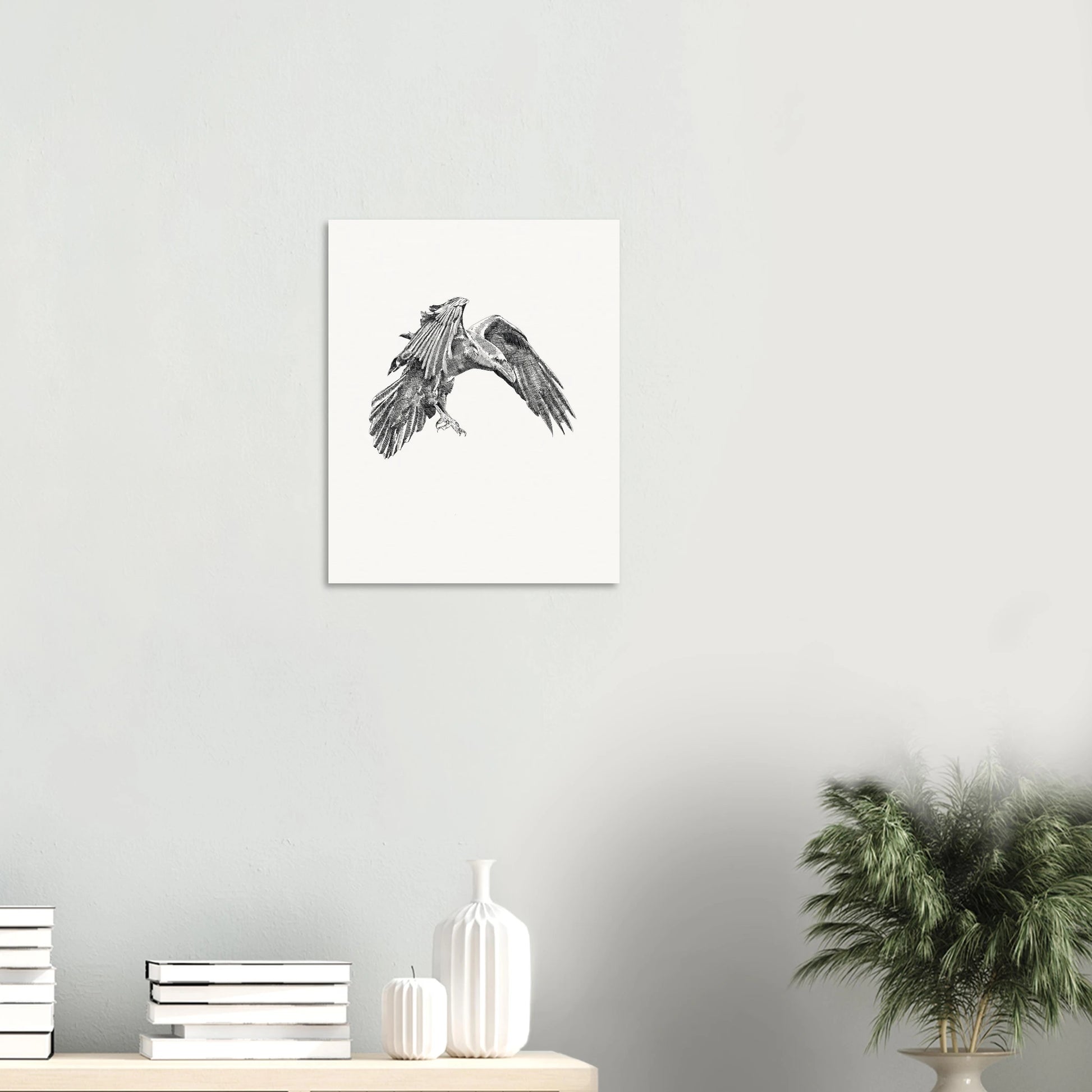 a detailed black and white drawing of a crow in flight on a stark white background